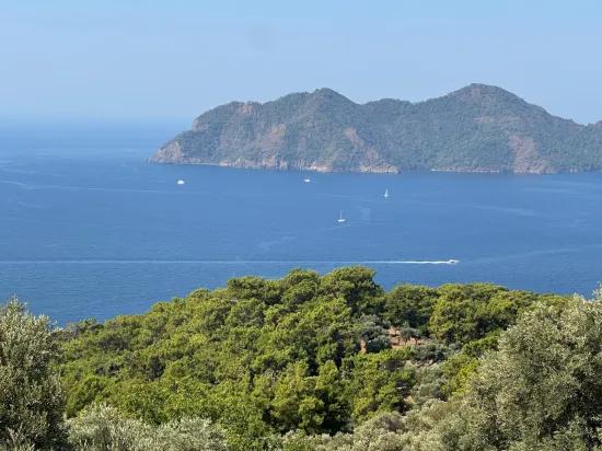 Çandır'da deniz manzaralı 21.000 m2 satılık 2b tarla