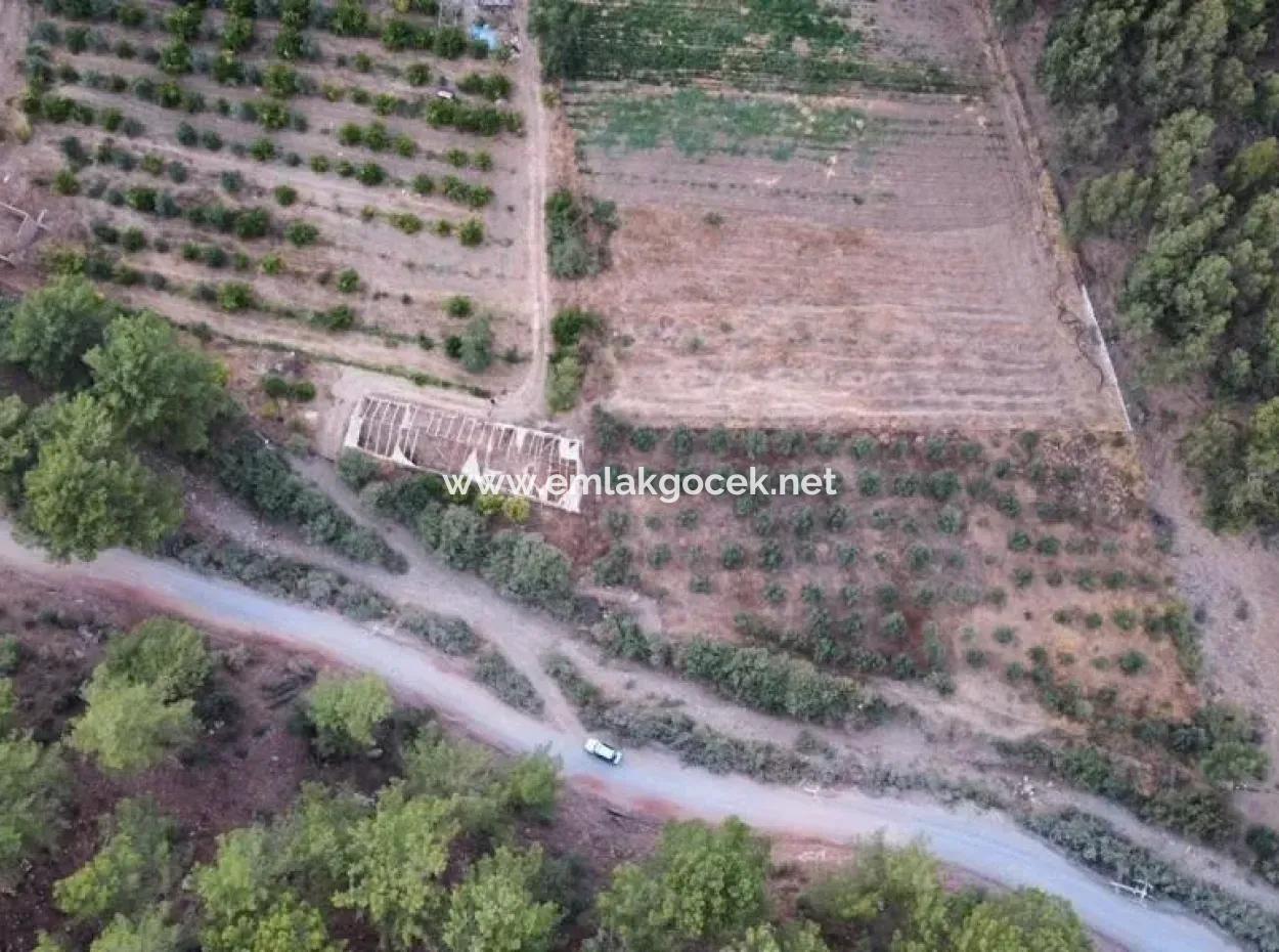 Mergenlide Aşı Koyu Yolu Üzerinde Satılık 3578M2 Tarla